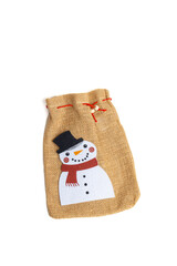 Christmas brown sack for packaging gifts. Christmas decoration. White background