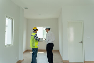 inspector engineer and owner project is inspecting construction and quality assurance new house....