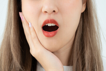 Asian woman feel toothache from gingivitis, female suffer tooth, decay problems, dental care....