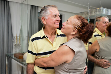 couple looking at each other, couple at home, portrait of couple, elderly couple, couple at home, senior couple ,  diverse couples, looking at yourself	