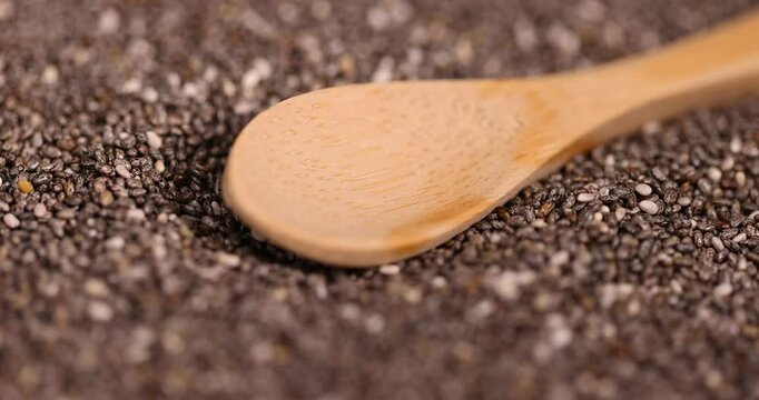 black and white chia seeds for a healthy diet, a large number of chia seeds for adding to yogurts, desserts and other food products
