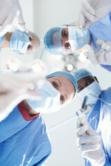 Low angle, people or surgeons in hospital for surgery, emergency accident or healthcare in theatre....