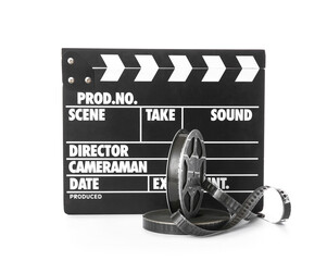 Movie clapper with film reels on white background