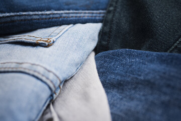 Fototapeta premium Denim texture for background design. Jeans texture. Jeans pants texture or denim pants background. Denim sales. Jeans fabric texture. Jeans trousers pants. Blue denim.