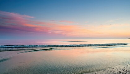Golden sunlight pierces through wispy clouds, painting the azure sky with warmth and promise.
