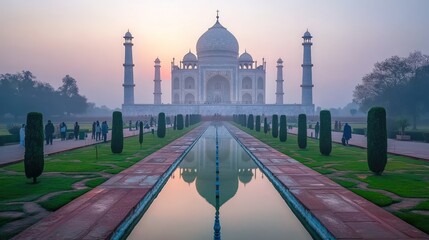 Obraz premium Taj Mahal sunrise reflection, serene beauty.