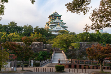 Osaka Castle from the side of the Gokuraku-bashi Bridge over the Inner Moat on a sunny autumn morning, Osaka, Japan