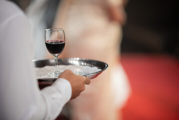red wine glass with bokeh background, enjoy party, drink don't drive concept. celebration party