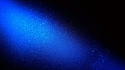 Obraz premium Deep Black to Vibrant Blue Gradient Abstract Background with Grainy Texture and Soft Blur Effect