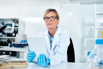 Woman, scientist and portrait with tablet at laboratory for investigation or study results in Germany. Mature person, medical research and confident for science or healthcare data, review and report