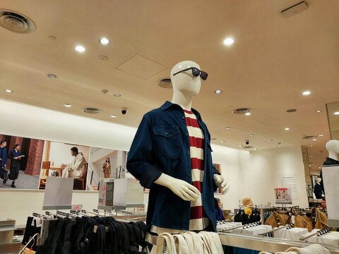 Yogyakarta, Indonesia - December 9, 2024: Mannequins wearing trendy clothes model at Uniqlo