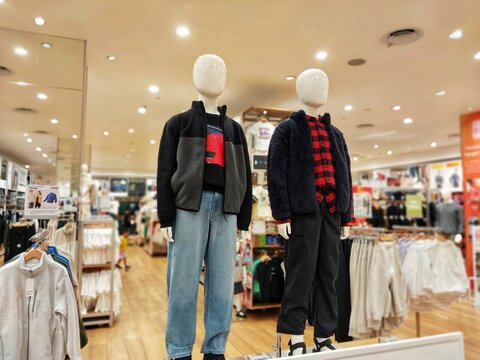 Yogyakarta, Indonesia - December 9, 2024: Mannequins wearing trendy clothes model at Uniqlo