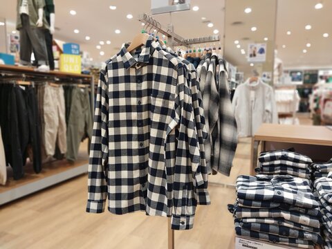 Yogyakarta, Indonesia - December 9, 2024: Mannequins wearing trendy clothes model at Uniqlo
