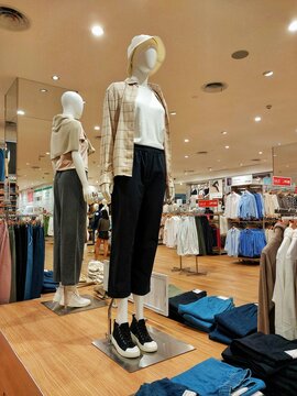 Yogyakarta, Indonesia - December 9, 2024: Mannequins wearing trendy clothes model at Uniqlo