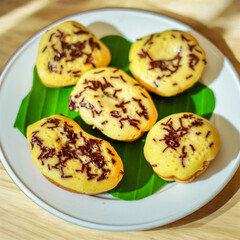 Fluffy Mini Cakes with Chocolate Sprinkles on a Plate