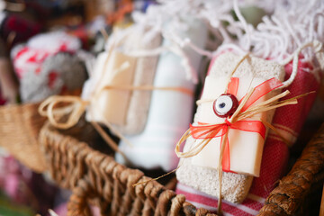 Stack of soap topped with evil eye beads, 