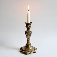 Naklejka premium A beautifully crafted antique candle holder with a flickering flame in a minimalist setting, photography of still life concept.