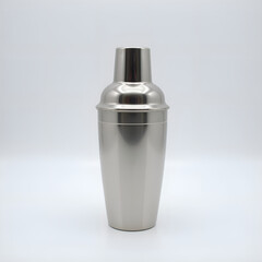 Elegant stainless steel cocktail shaker on minimalist background for creative mixology inspiration, photography of still life concept.