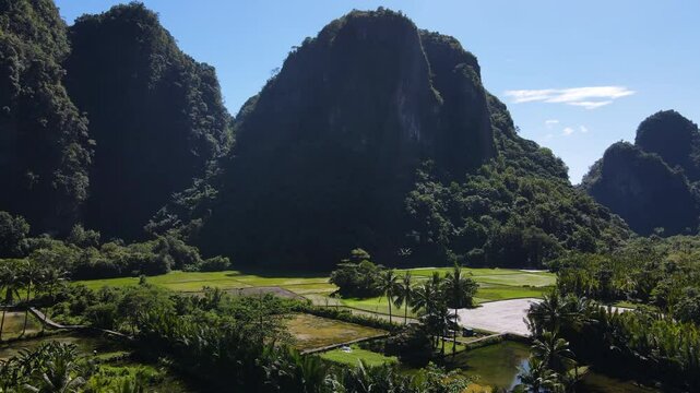 A Picturesque View of Rammang Rammang Karst Village in Sulawesi, Indonesia - Aerial Pullback Shot