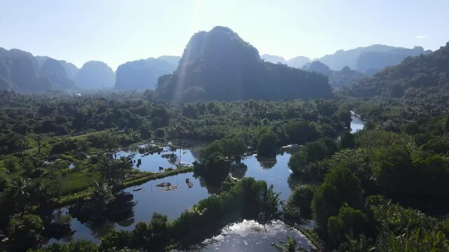 Scenic Karst Formation In Rammang-rammang Village At Sunrise Near Makassar In Sulawesi, Indonesia. Aerial Shot