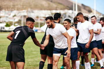 Rugby, team and handshake for greeting, introduction or sportsmanship on grass field outdoors. Sports men shaking hands and welcome for game rival, competition or training with workout and exercise