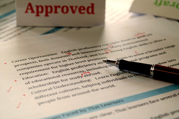English article being proofread in office