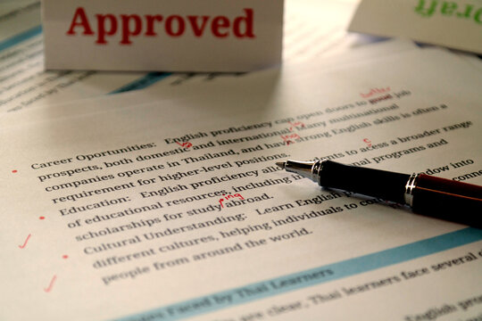 English article being proofread in office