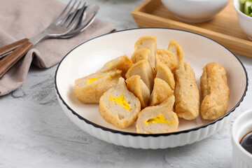 Pempek or Indonesian fish cake. Made from fish and flour. served with cuko. originated from palembang, sumatera. Perfect for recipe, article, catalogue, photo illustration, or any commercial purposes.