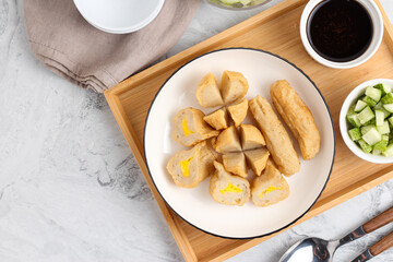 Pempek or Indonesian fish cake. Made from fish and flour. served with cuko. originated from palembang, sumatera. Perfect for recipe, article, catalogue, photo illustration, or any commercial purposes.