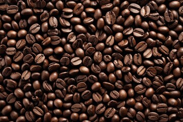 Obraz premium a close up of a pile of coffee beans with a lot of coffee beans