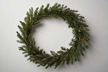 a close up of a wreath of evergreen leaves and berries