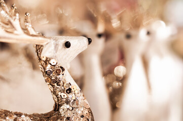 Close-up of the Christmas Reindeer Figurine on a blurred background