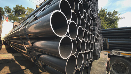Construction products on transport vehicles Group of steel pipes for industrial materials...