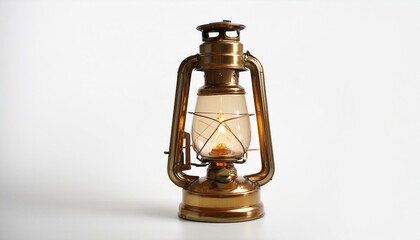 Antique brass lantern glows softly on a white background. A nostalgic piece with warm lighting.