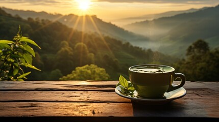 A steaming cup of green tea with morning dew and the sun peeking over the horizon
