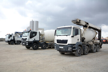 A crane-manipulator is a mechanized equipment installed on a vehicle. concrete mixer