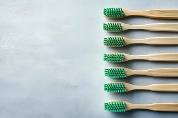 Eco-Friendly Bamboo Toothbrushes on Simple Background