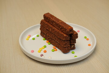 Chocolate wafers on a white plate, close-up
