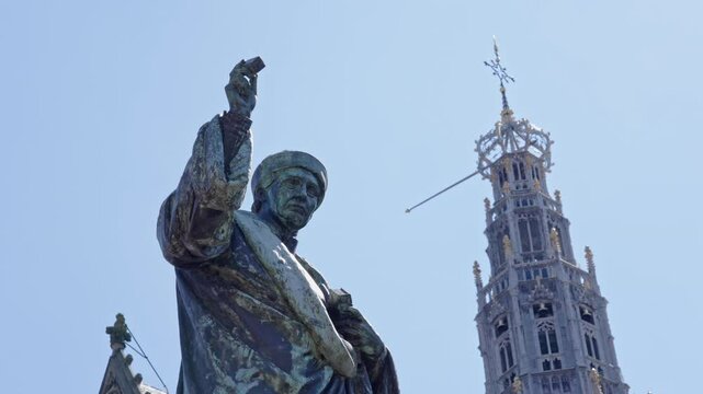 Laurens Janszoon Coster statue with grote kerk church steeple in background