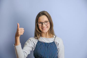 adorable smiling child looking at camera in eyeglasses