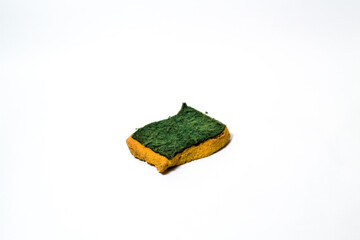 Old Scouring Pad or Kitchen Sponge on isolated white background, mainly used for washing dishes