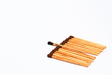 Wooden match sticks on isolated white background