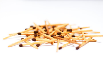 Wooden match sticks on isolated white background