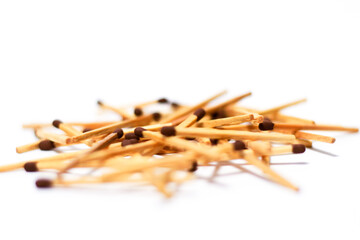 Wooden match sticks on isolated white background