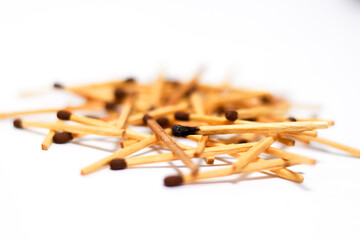 Wooden match sticks on isolated white background