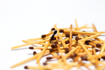 Wooden match sticks on isolated white background