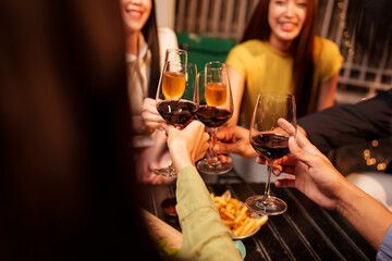 Throw a party Celebrate whiskey at a friendly party in a restaurant. Night.