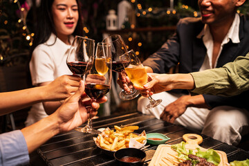 Throw a party Celebrate whiskey at a friendly party in a restaurant. Night.