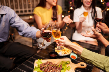 Throw a party Celebrate whiskey at a friendly party in a restaurant. Night.