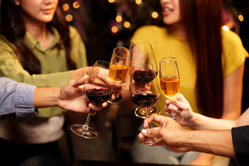 Throw a party Celebrate whiskey at a friendly party in a restaurant. Night.